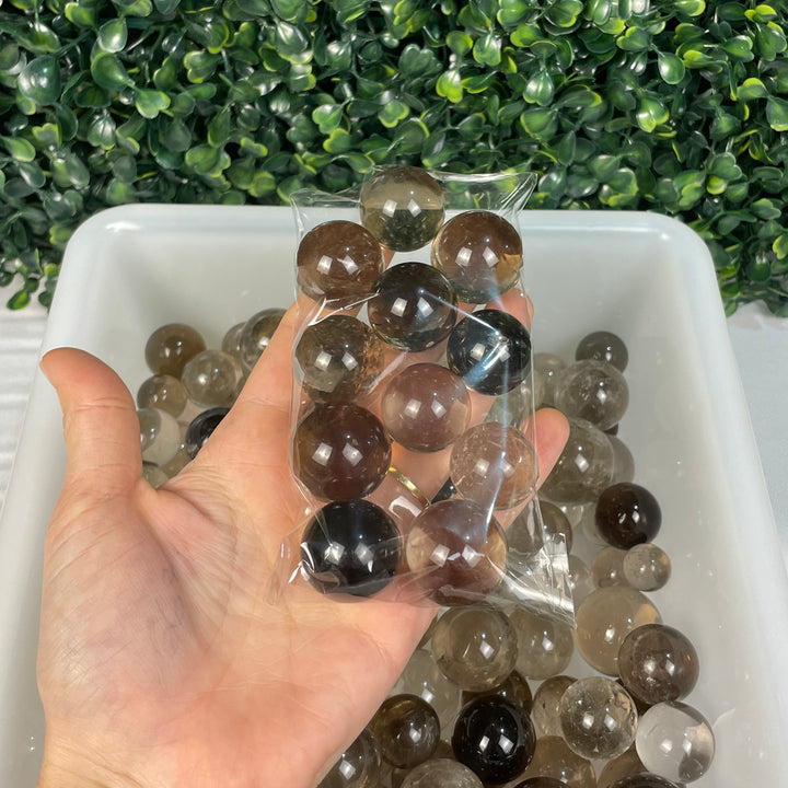 NATURAL SMOKY QUARTZ SPHERES WHOLESALE - Amezoni Crystals Wholesale