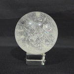Side view of Lemurian Quartz Sphere showing natural crystal details