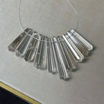 Close-up of Clear Quartz Mini Vogel - Drilled for Jewelry with visible color and formation
