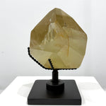 Side view of Natural Citrine Free Form With Stand showing natural crystal details