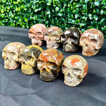 Side view of Jasper Carving Skull - 8 PCS showing natural crystal details