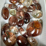 Side view of AAA+ Garden Quartz Lens Lot showing natural crystal details