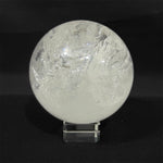 Side view of Lemurian Quartz Sphere showing natural crystal details