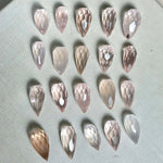 Rose Quartz Teardrop Briolette - Drilled for Jewelry shown for scale and natural variation