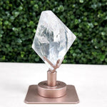 Close-up of Lemurian Quartz Display Piece - Faceted Lemurian with Spinning Stand with visible color and formation