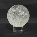 Close-up of Lemurian Quartz Sphere with visible color and formation