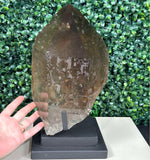 Close-up of Diamantina Quartz Point - 100% Natural Smoky Point with Stand with visible color and formation