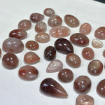 Side view of Rutile Quartz Cabochon - Red Rutile Cabochons Lot showing natural crystal details