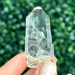 Close-up of Clear Quartz Point - Crystal Selection Points Raw with visible color and formation