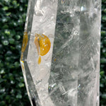 Side view of Lemurian Quartz Point - Lemurian Hematite Point with Stand showing natural crystal details