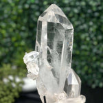 Close-up of Diamantina Quartz Cluster - Semi Polished Laser Cluster with Stand with visible color and formation