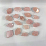 Close-up of Rose Quartz Free Form with visible color and formation