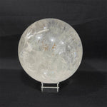 Close-up of Lemurian Quartz Sphere with visible color and formation