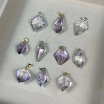 Close-up of Amethyst Pendant - Rose De France Pendants Lot with visible color and formation