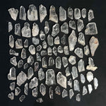 Side view of Clear Quartz Point - Crystal Selection Points Raw showing natural crystal details