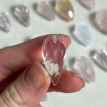 Close-up of Rose Quartz Teardrop Briolette - Drilled for Jewelry with visible color and formation