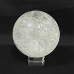Close-up of Lemurian Quartz Sphere with visible color and formation