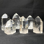 Side view of Clear Quartz Tower High Quality - Wholesale Bulk showing natural crystal details