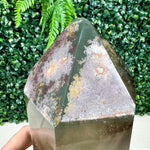 Side view of Smoky Phantom Garden Quartz Point with Spinning Stand showing natural crystal details