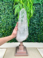Side view of Lemurian Quartz Point with Stand showing natural crystal details