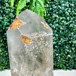 Close-up of Garden Smoky Quartz DT point with stand with visible color and formation