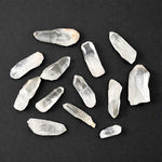 Side view of Lemurian Quartz Points - 1kg Lot showing natural crystal details