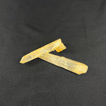 Side view of Tangerine Quartz Point - Unpolished Tangerine Laser Point showing natural crystal details