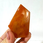 Side view of Amphibole Quartz Free Form - Amphibole Red and Yellow Free Form Lot showing natural crystal details