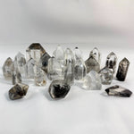 Lemurian Quartz Free Form - Black Phantom Lemurian Towers and Free Form Lot from Amezoni Crystals, front view