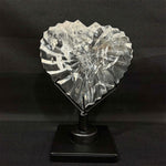 Close-up of Lemurian Quartz Heart - Faceted Lemurian Heart with Stand with visible color and formation