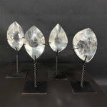 Side view of Lemurian Quartz Display Piece - High Quality Faceted Lemurian with Stand showing natural crystal details