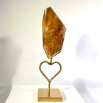 Close-up of High Quality Golden Healer Free Form with Stand with visible color and formation