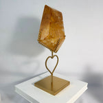 Close-up of High Quality Golden Healer Free Form With Stand with visible color and formation
