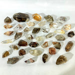 Close-up of High Quality Inclusion Garden Quartz Free Form Lot with visible color and formation