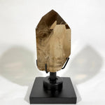 Side view of Lemurian Quartz Tower - High Quality Lemurian Towers With Spinning Stand showing natural crystal details