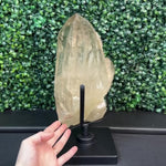 Semi Polished Elestial Citrine w/ Stand product video showing Shop Semi Polished Elestial Citrine with Stand Display Piece from Amezoni in Brazil.