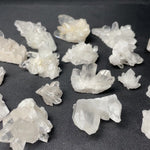 CLEAR QUARTZ CLUSTER - 1kg Lot product video showing Brazilian Clear Quartz Cluster - 1kg Lot wholesale.