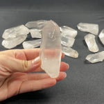 Semi Polished Lemurian Quartz Points Lot product video showing Brazilian Lemurian Quartz Points - 1kg Lot wholesale, view 5.