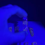 UV Reactive Amethyst Phantom Double Terminated product video showing Brazilian UV Reactive Amethyst Phantom Double Terminated wholesale.