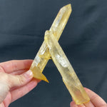UNPOLISHED TANGERINE LASER POINT product video showing Tangerine Quartz Point - Unpolished Tangerine Laser Point from Amezoni Brazil.