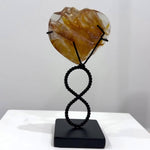 Golden Healer Faceted Heart With Stand product video showing Exact photos, natural variation details, and worldwide FedEx shipping.