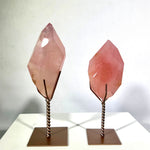 Close-up of Rose Quartz Free Form with Stand with visible color and formation