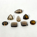 Side view of Smoky Quartz Faceted Cabochons Lot showing natural crystal details
